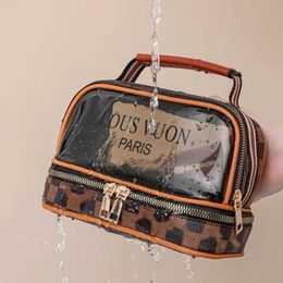 Makeup bag with high aesthetic value, high-end portable transparent wash bag, waterproof Instagram style storage bag, for business trips, travel, and personal use 240102