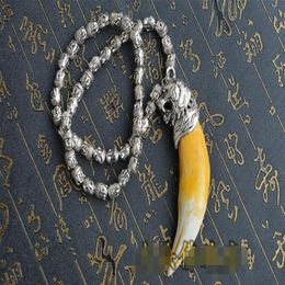 Imitation tiger tooth pendant animal teeth pendant collection domineering side leakage tiger teeth wenwan cattle bones evil spirit244Z