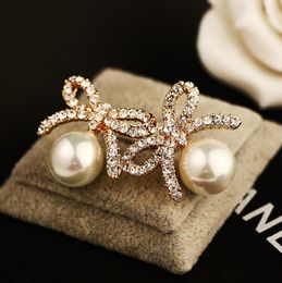 Fashion exquisite zircon bow pearl Stud earrings highgrade 18K goldplated hypoallergenic female cute girl earrings2427415