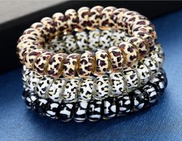 50PCSWomen Girl Telephone Wire Cord Gum Coil Hair Ties Girls Elastic Hair Bands Ring Rope Leopard Print Bracelet Stretchy Hair Rop2309158