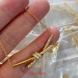 2024 new Designer Tifannissm necklace Stainless steel V gold knot hand set diamond elegant and trendy popular on the internet high quality Pan