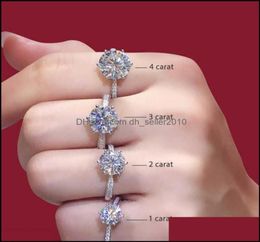 Solitaire Rings Jewelry925 Sterling Sier Moissanite Classic Style Round Cut Single Row Diamond Engagement Anniversary Ring 1Ct 2Ct3669440