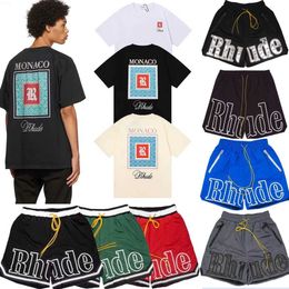 Mens Tshirts Rhude Shirt Designer Shorts Rhude Summer Fashion Beach Pants Short Sleeves Shirts Casual t Tees Blue Black Mesh Shorts Tops Tracksuit R8TI