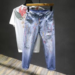 Graffiti Ripped Men's Jeans Korean Fashion Hole Designer Jeans Pencil Pants Streetwear Hip Hop Denim Pants Men Cowboy Trousers 240102