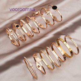 Car tires's Designer Bracelets for women and men The new titanium steel rose gold bracelet is light extravagant the design of small high With Original Box