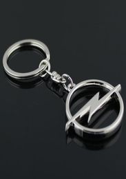 5pcslot Fashion Metal 3D Car Logo Keychain Key Chain Keyring Key Ring Chaveiro Llavero For Opel Auto Pendant Car Accessories Whol5165669