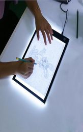 DHL LED Graphic Tablet Writing Painting Light Box Tracing Board Copy Pads Digital Drawing Tablet Artcraft A4 Copy Table LED Board 4977792