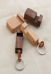 Keychains 1 Piece Of Fashion Creative Lightweight Slim Design Wooden Mobile Phone Stand Holder Pendant Keychain 2022 Smal225578388