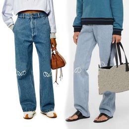 Designer-Jeans für Damen, eingetroffen, hohe Taille, Straße, ausgehöhlter Patch, bestickte Dekoration, lässige blaue, gerade Denim-Hosen