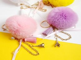 Keychains 2021 Lovely Eiffel Tower Natural Fur Pompom Furry Ball Keychain For Women Key Chains Bag Imititated Pearl Pendent D5211049808