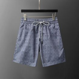 Herren-Shorts, Sommer-Designer, lässige Sporthose, 2024, modische, schnell trocknende Herren-Strandhose, schwarzer und weißer Buchstabe