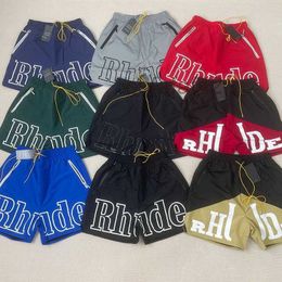 Summer Mens Womens Rhude Shorts Fashion Casual Leathier Knee Length Loose Skateboard Hip Hop Swim Pants Beach Rhude Pocket Quality Zipper Short Asian Size 3E4X