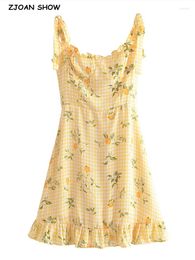Casual Dresses 2024 Retro French Yellow Flower Plaid Print Mini Dress Sexy Women Wood Ear Ruffles Hem Tide Bow Strap Sling Holiday Robe