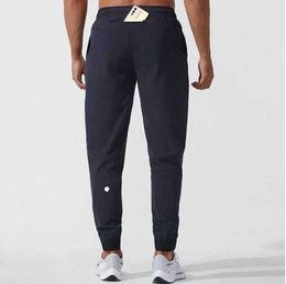 LU womens LL Men's Jogger Long Pants Sport Yoga Outfit Quick Dry Drawstring Gym Pockets Sweatpants Trousers Mens Casual Elastic Waist fitness666878