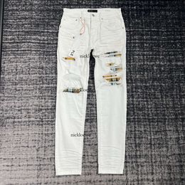 Jeans strappati firmati Pantaloni mendicante da uomo firmati Jeans firmati da uomo Europa e Stati Uniti High Street stagione estiva 2024 nuovi pantaloni patch moda z6