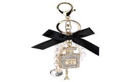 2022 Imitation Pearl Perfume Bottle Keychain Car Key Ring Holder Bag Charm Pendant Accessories Bow Key Chain Fashion Keyring AA2203181751