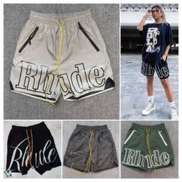 I85U Designer Rhude Shorts Mens Short Beach Mesh Street Sweatpants Basketball Men Limited Swim Knee Length Hip Hop High Sports Training Elastic Waist