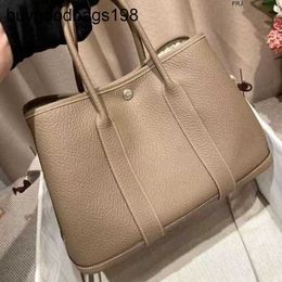 Designer Garden Party Bags 2024 New Texture Leather Large Capacity Portable Bucket One Shoulder Crossbody Tote Commuter Womens Have Logo 0bbc WM0E