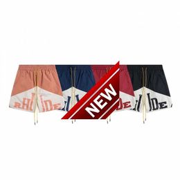American fashion label letter print patchwork casual sports shorts for men and women loose quarter drawstring quick drying pants