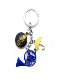 Whole 20pcslot Himym How i Met Your Mother Yellow Umbrella Mother Blue French Horn Keychain Key Holder Pendant Car Keychain H1302171