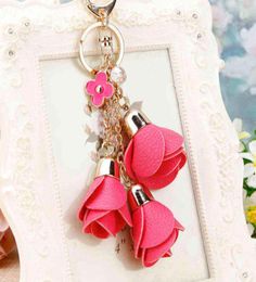 New charm fashion leather rose flower key chain cute tassel flower key chain women keychain female bag pendant jewelry AA2203184205345
