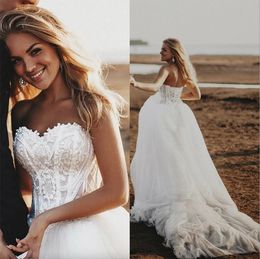 Bohemian 2024 Country Dresses Sweetheart Lace Appliques Boho Bridal Gowns Sexig backless Sweep Train A Line Wedding Dress