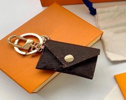 Designer Letter Wallet Keychain Keyring Fashion Purse Pendant Car Chain Charm Brown Old Flower M68863 Mini Bag Trinket Gifts Acces3962463