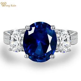 Display Wong Rain 100% Sterling Sier Oval 5ct Sapphire High Carbon Diamond Gemstone Wedding Engagement Fine Jewelry Ring for Women