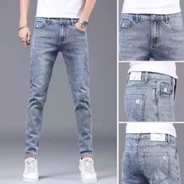 2023 Spring and Autumn Fashion Solid Color Holes Small Feet Pants Men Casual Slim Comfortable Elastic HighQuality Jeans 36 240104