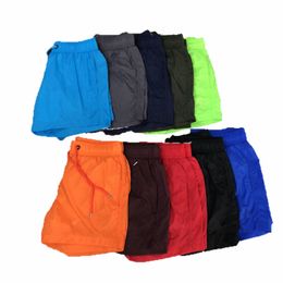 Luxury shorts fashion men women tops short loose Sports Summer Womens Short Swimwear pants Clothing Hip Pop Pants With Pocket 10 styles red blue green