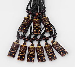 Drop 12pcs Mens Brown Tribal Yak Bone Carved Tiki Man Totem NecklacePendants 51x18mm N25334775776