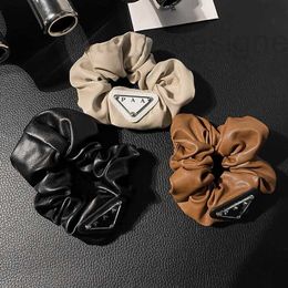 Hair Rubber Bands Designer Brand Luxury New Leather Charm Rope Autumn Girls Cute Style Black Gift Design for Women Romantic Jewellery DSLU