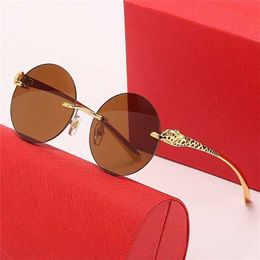 15% OFF Wholesale of New frameless retro round for men and women leopard head painted mirror legs personalized sunglasses trendy glasses