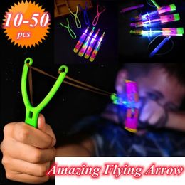 50/30/20/10pcs Amazing Light Toy Rocket Helicopter Flying Toy LED Light Toys Party Fun Gifts Rubber Band Catapult 240105