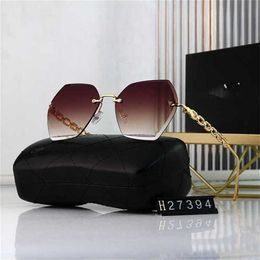 12% OFF Wholesale of sunglasses Frameless Large Frame Women's Printed Sunglasses Xiaoxiang New Glasses