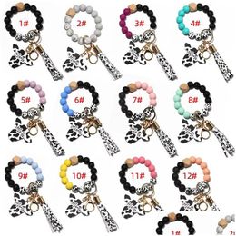 Party Favour Sile Cursive Cow Bead Bracelet Wood Disc Keychain Tassel Ox Head Wrist Key Ring Charm Pendant Accessory Wholesale Drop De Dhuyf