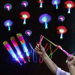 30/50/100pcs Amazing Light Toy Rocket Helicopter Flying Toy LED Light Toys Party Fun Gift Rubber Band Catapult 240105