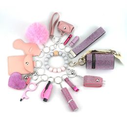 15pcs Portable Lipstick Masonry Defense Women Outdoor Fur ball pendant Keychain Set Key ring With Cylinder storage bag 240106