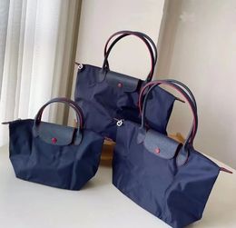 Designer Handbag ShoulderCasual Dumplings Bag Nylon HandbagcrossbodyFolding Bag Embroidered Shopping Bag Backpack