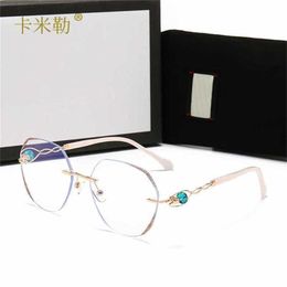 12% OFF Wholesale of New online celebrity Tiktok fashion trend sunglasses women go shopping personality rimless cut edge glasses 811