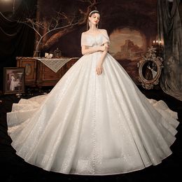 Luxury Ball Gown Wedding Dresses 2024 bling off shoulder Sequins Appliques Beaded Sparkly Ruffles Formal Bridal Gowns lace up Plus Size Custom Made Vestido de novia