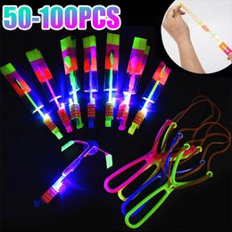 20-100pcs Amazing Light Toy Rocket Helicopter Flying Toy LED Light Toys Party Fun Gift Rubber Band Catapult for Kids Boys 240105