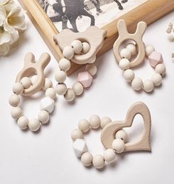 INS Baby cartoon silicone teether wood beads bracelets soothers for infant kids toys boys rattles girls gift Q30643573852