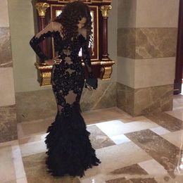 Sexy Black Feathers Mermaid Prom Dresses For Black Girls Lace Appliques Floor Length Long Sleeves Special Occasion Gowns Illusion African Evening Dress