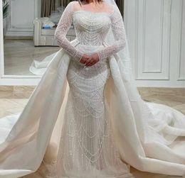 2024 Abito da sposa arabo di lusso maniche lunghe Bateau paillettes lucide Perle in rilievo 3D pizzo treno staccabile Abiti da sposa Vestido De Novia Custom Made