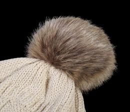 Brand Winter Warm Thicker Soft Stretch Cable Beanies Hats Women Faux Fur Pom Pom Knitted Skullies Caps9931859