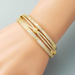 A Classic Cartres Bangle Creative and personalized minimalist geometric buckle bracelet for women with copper plated real gold micro inlaid zircon cold cool style