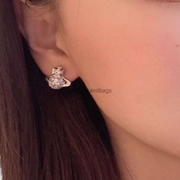 Designers jewels Vivienne Empress Dowager Xi the same full diamond hollow Saturn earrings for women trendy and niche design versatile light luxury and highend earri