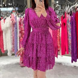 Sexy V-neck long sleeved hollow mini dress with sparkling sequins autumn women's dress fashionable women's high waisted pleated cake dress 240108