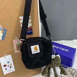 Classic small black bag ins skateboard bag ulzzang street photo earth cool bouncing cross body bag men's and women's shoulder bag